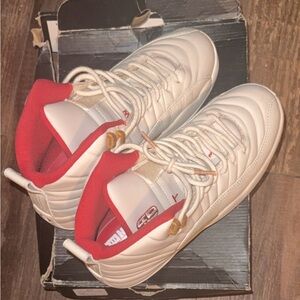 Jordan Red and White High-Tops with Gold Accents